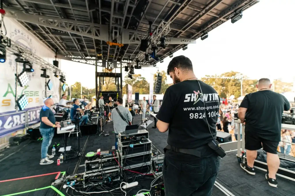 Technical crew setting up event equipment